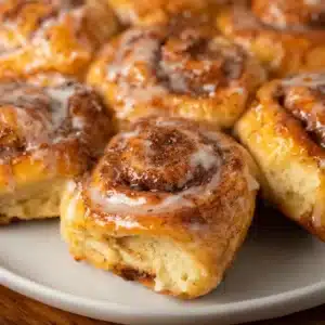 Air Fryer Cinnamon Rolls 5 Air fryer cinnamon rolls golden brown with icing drizzle